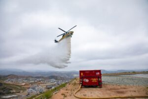 Helicopter doing a water drop