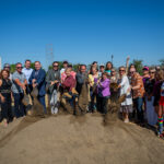 Dignitaries throwing ceremonial dirt