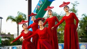Women performing in traditional outfits