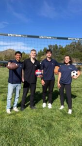 City staff with different sports balls