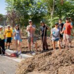 Volunteers spreading mulch