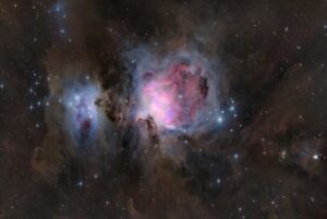 Painting of a galaxy with black, blues and purples