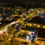 Drone shot of Main Street lit up at night