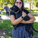 Woman holding a puppy