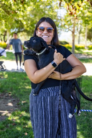 Woman holding a puppy