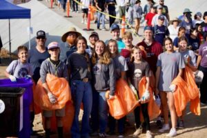 Group of smiling volunteers at the River Rally event