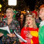 Carolers singing on Main Street
