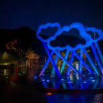 When a Cloud Met Cloud Public Art piece at Central Park and River of Lights behind it. The River of Lights Holiday Light Show will take place at Central Park from dusk until 10:00 p.m. through New Year's Eve.