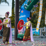 Celebrate Thailand Performers with Umbrellas on Stage